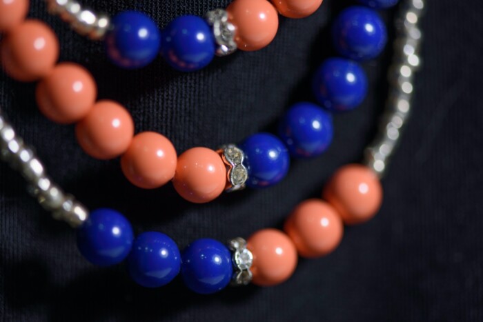 Collar "Blue Tangerine" made of orange-blue Swarovski beads close up